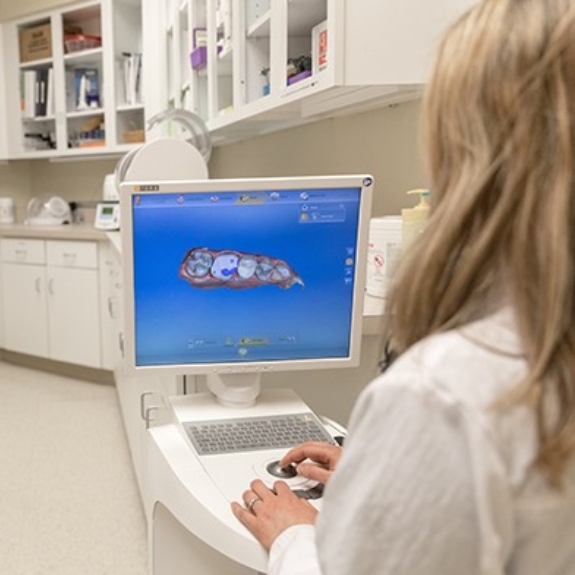 Dr. Nusi brown using advanced digital imaging system